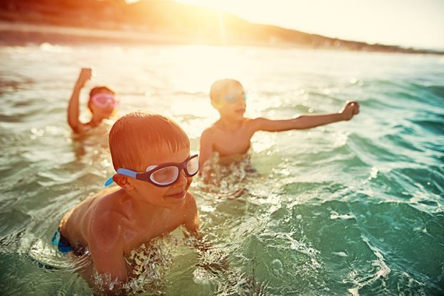 On the beach and swimming in the sea - Safer Tourism Foundation : Safer  Tourism Foundation