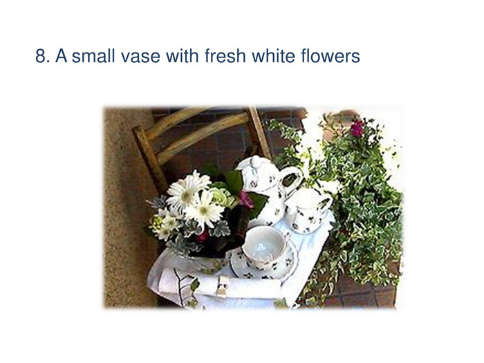 8. A small vase with fresh white flowers