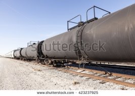 https://thumb7.shutterstock.com/display_pic_with_logo/69090/423237925/stock-photo-goods-and-cistern-wagons-on-the-railroad-423237925.jpg