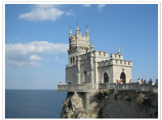 http://upload.wikimedia.org/wikipedia/commons/8/8b/The_Swallow%27s_Nest_castle_on_the_Aurora_cliffs_of_cape_Ai-Todor_%282005-09-229%29.jpg