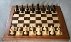 250px-Chess_board_opening_staunton