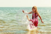 http://thumbs.dreamstime.com/x/little-girl-kid-splashing-sea-ocean-water-fun-child-having-woman-bathing-summer-vacation-holiday-relax-61371702.jpg