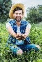 Handsome Happy Farmer Showing Ripe Potatoes Hands Field — Stock Photo ©  VitalikRadko #204205862