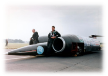 Thrust SSC supersonic car and team Photograph by Science Photo Library