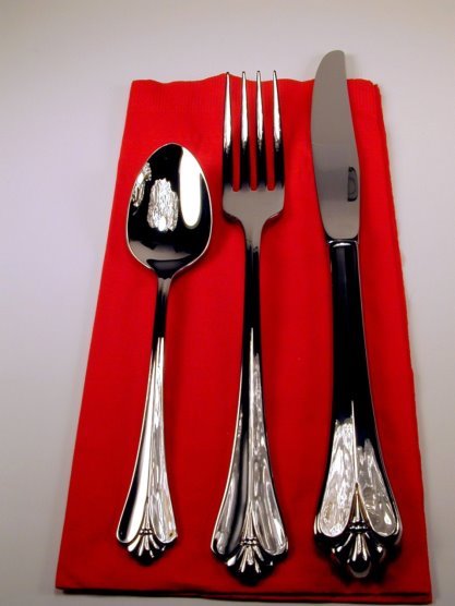 http://www.bridalbuds.com/wp-content/uploads/silverware_spoon_fork_knife_red_napkin.jpg