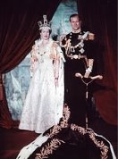 Elizabeth in crown and robes next to her husband in military uniform