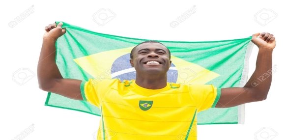 Happy Brazilian Football Fan Cheering Holding Flag On White Background  Фотография, картинки, изображения и сток-фотография без роялти. Image  30869838.