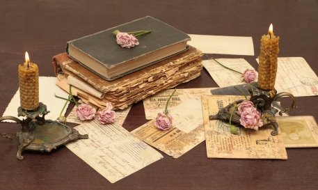 http://images.forwallpaper.com/files/thumbs/preview/10/109979__vintage-vintage-books-old-flowers-roses-candles-candle-holders-letters-cards-paper-table_p.jpg