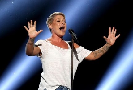 Singer Pink says she had COVID-19, gives $1M to relief funds