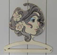 Awesome vintage ladies head / face plastic clothing or coat hanger in color. Made in West Germany