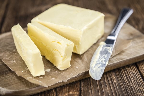 http://www.starkelnutrition.com/wp-content/uploads/2017/05/block-of-butter-on-wooden-chopping-board.jpg